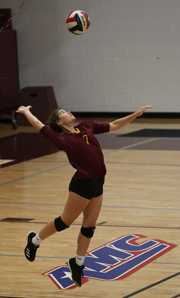 Stephens College sophomore Mollie Thompson serves the ball